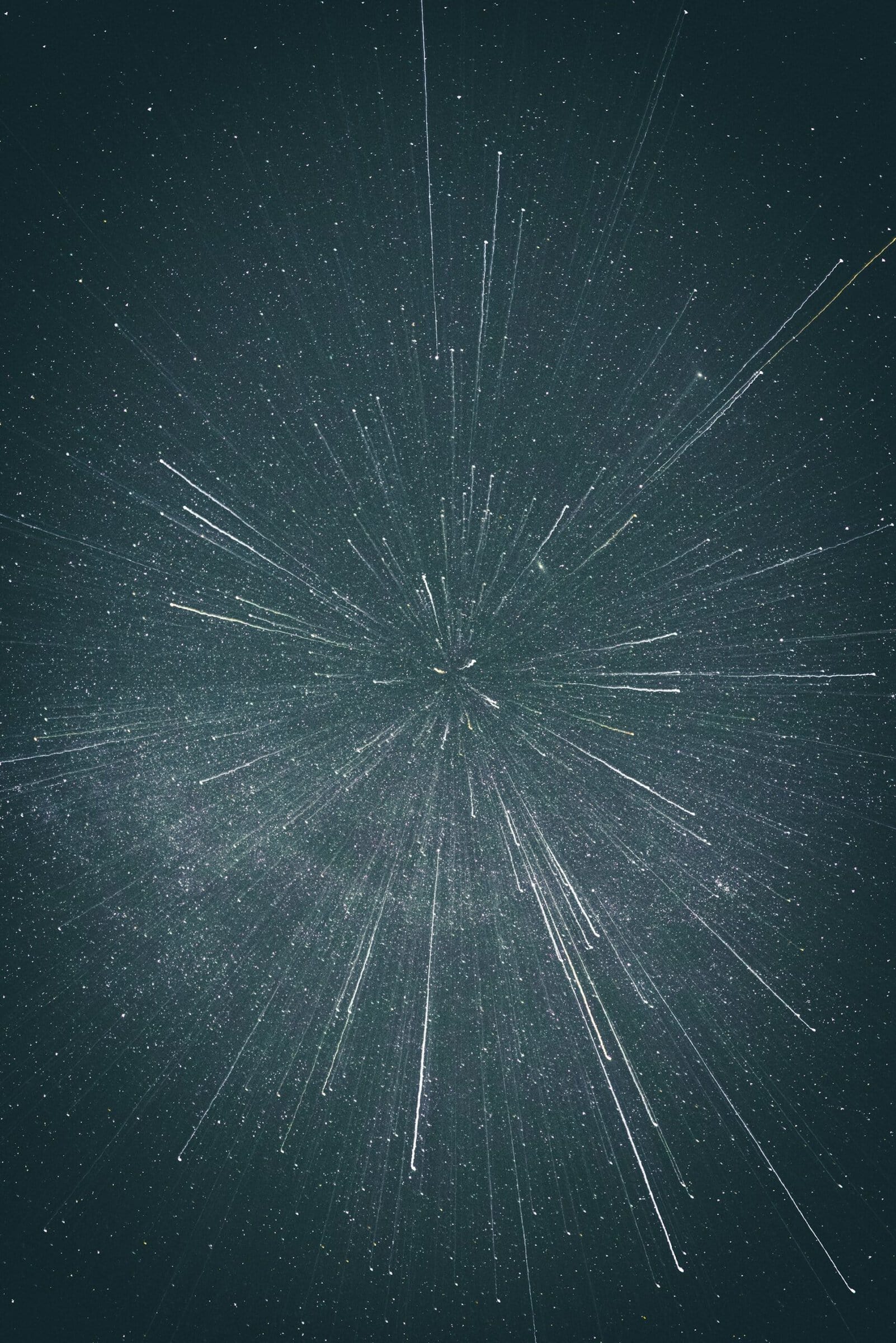 Stars and comets across dark sky